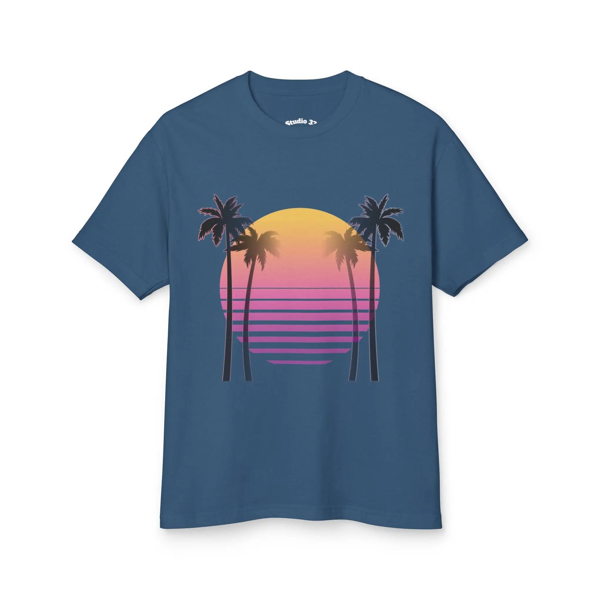 Blue t-shirt with a sunset and palm tree design on a white background