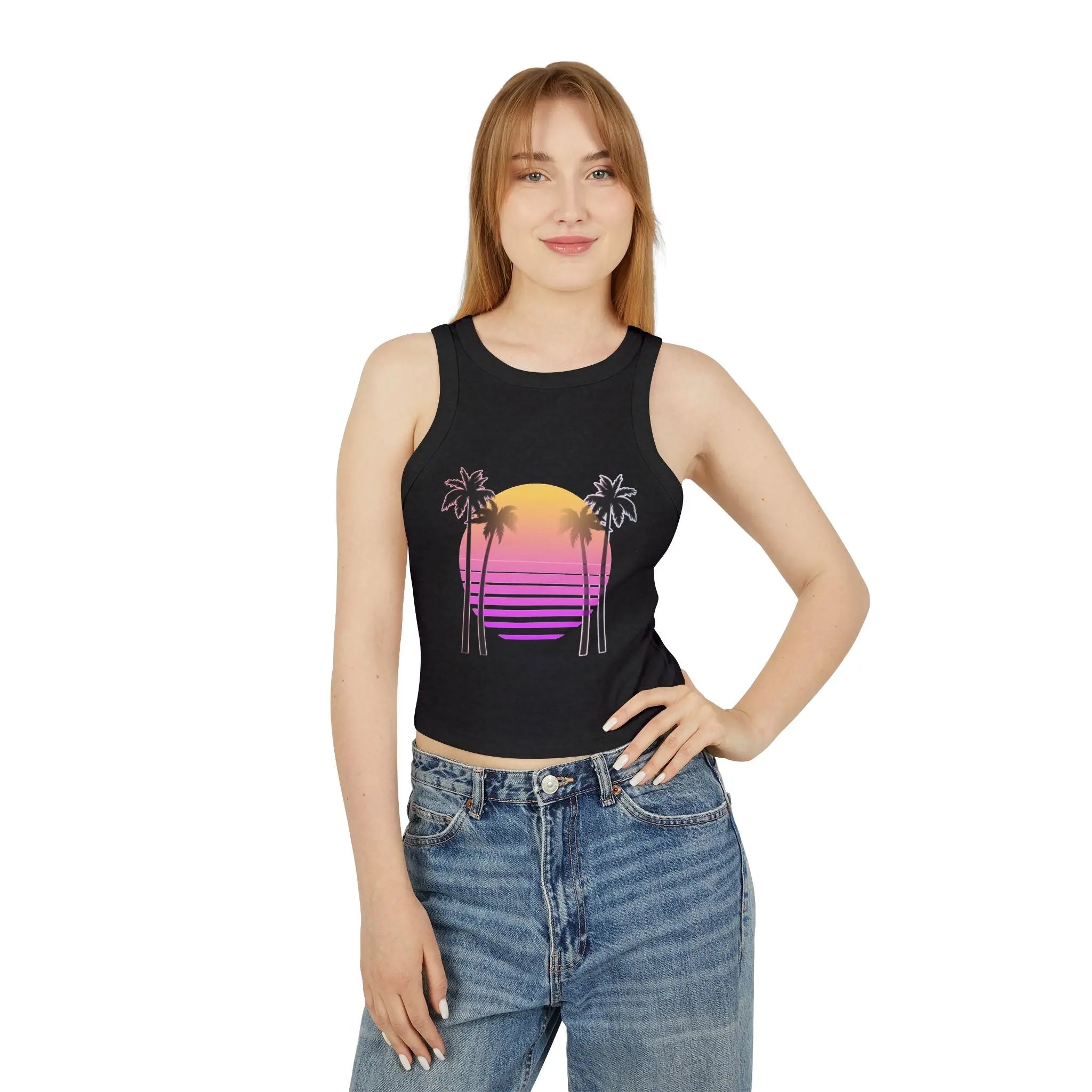 Woman wearing a black tank top with a colorful palm tree design on a white background
