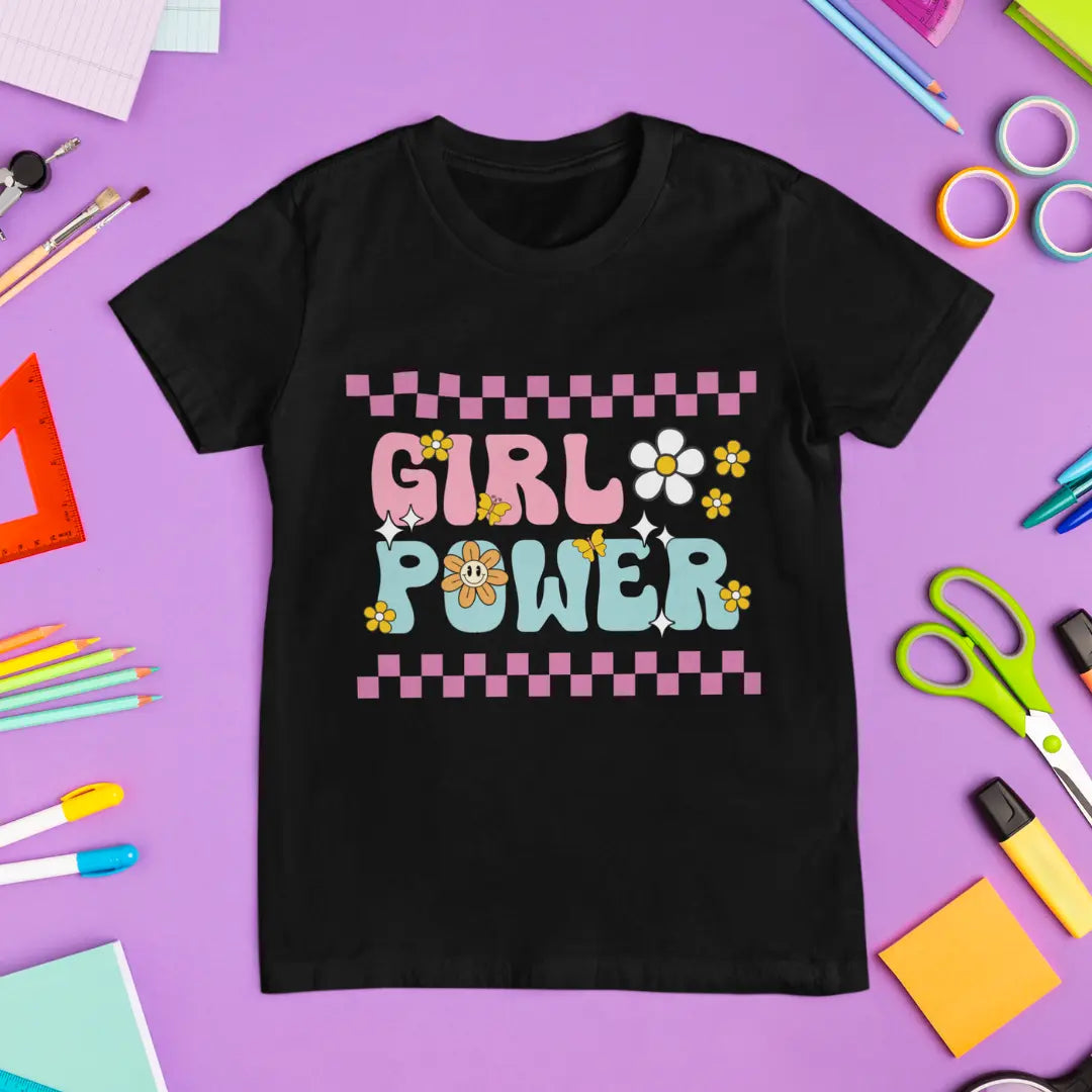 Black t-shirt with 'Girl Power' design on a purple background with school supplies.