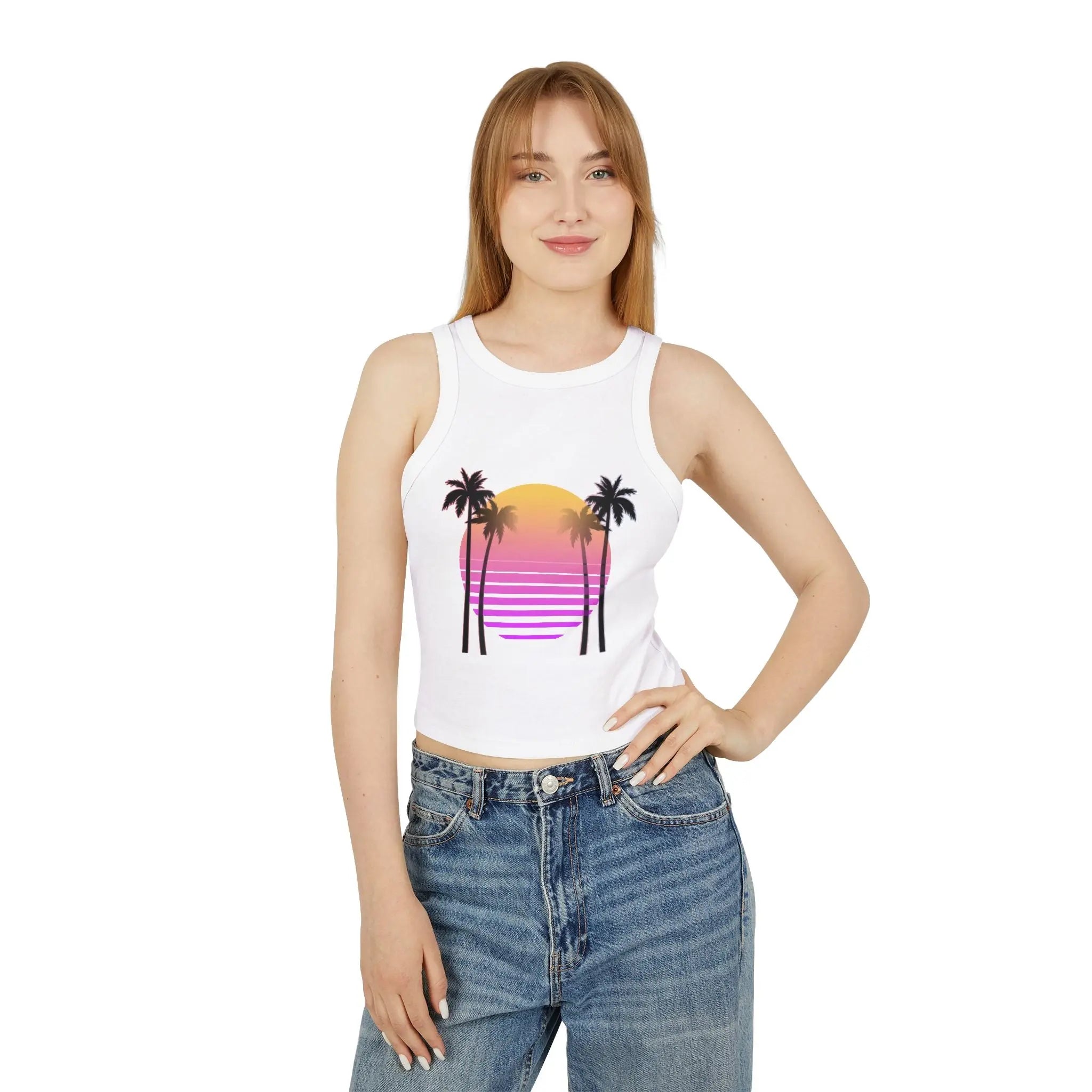 Woman wearing a white tank top with a palm tree and sunset design on a white background