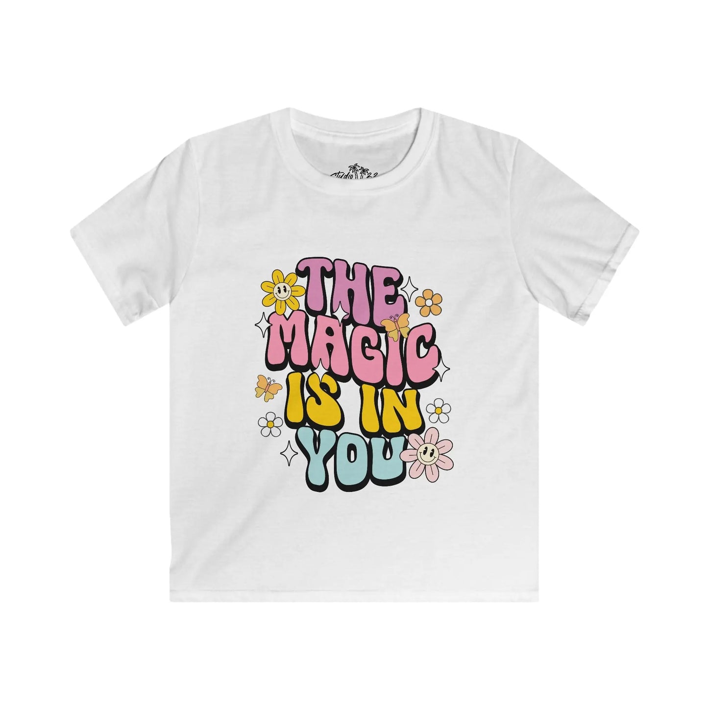 White t-shirt with colorful text 'The Magic is in You' on a white background