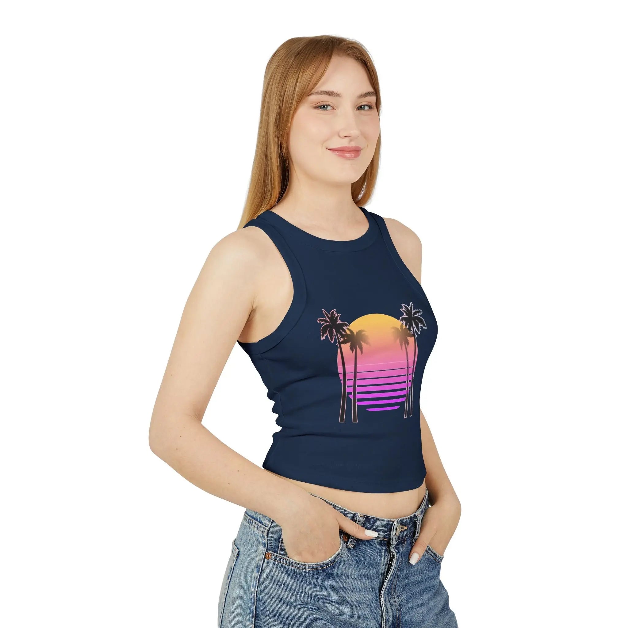 Woman wearing a navy blue tank top with a colorful palm tree design on a white background