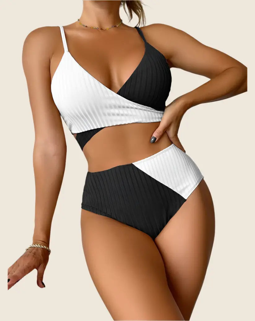 Black and white bikini set on a beige background