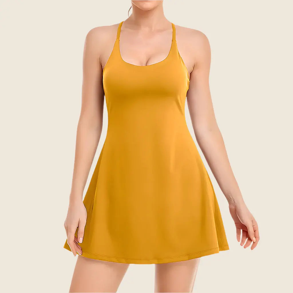 Yellow sleeveless dress worn by a model on a beige background