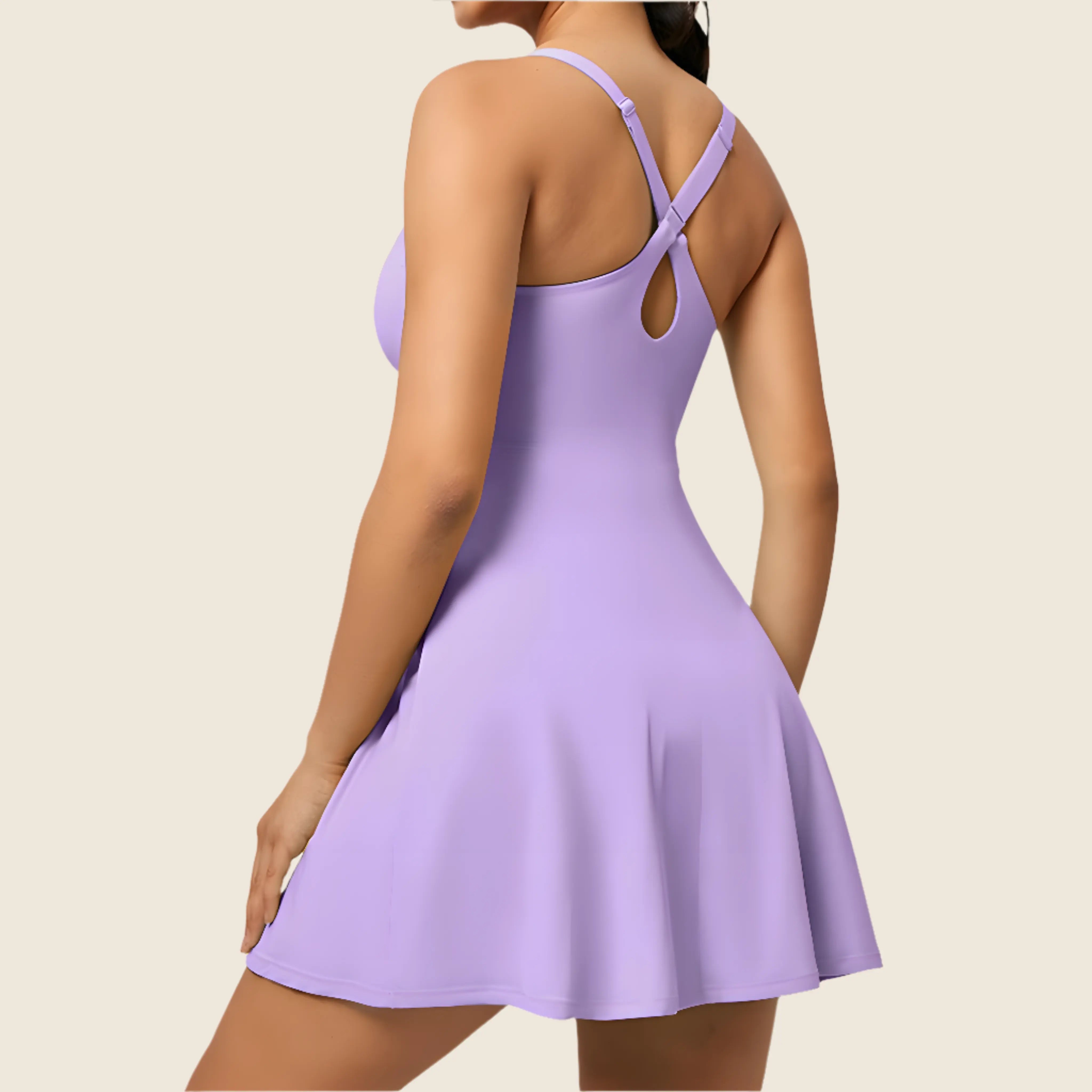 Lavender dress worn by a person on a beige background