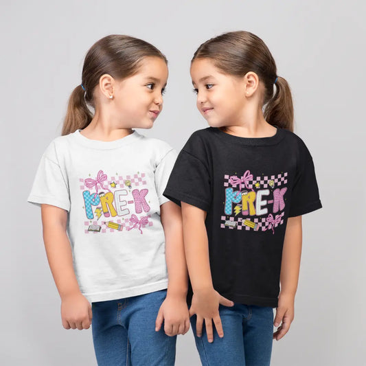 Two children wearing t-shirts with 'PRE-K' text on a gray background